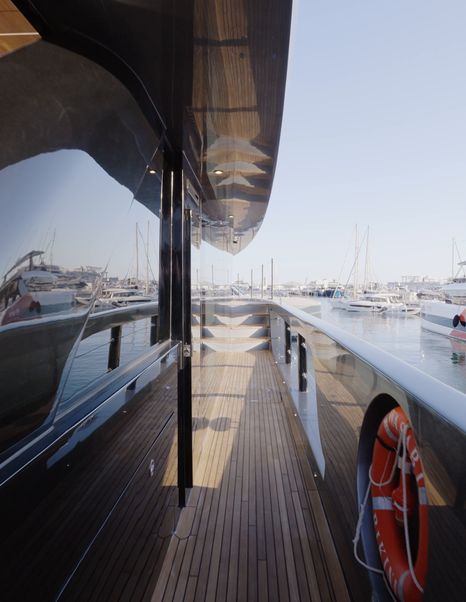 Sunreef Ultima 88 covered side deck with high bulwarks and long hull glazing