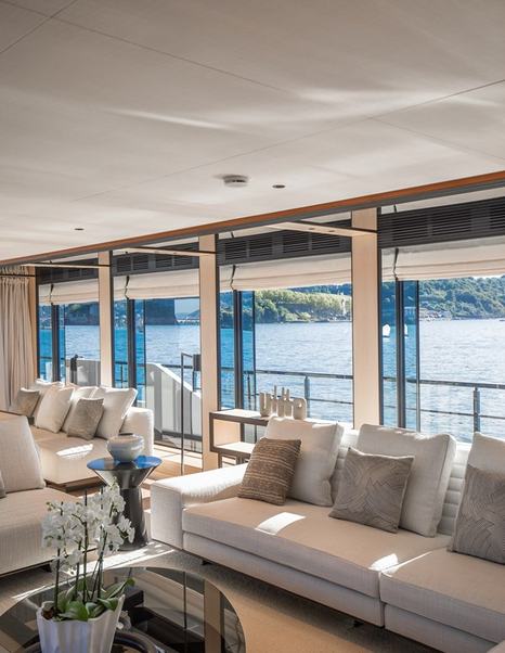 Superyacht Andala main saloon plush white seating 