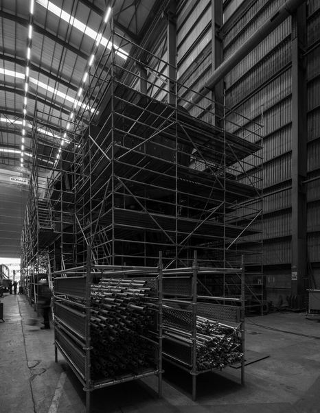 Superyacht Sea Rover covered in scaffolding under construction in black and white 