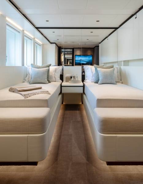 Twin bedroom with white walls on motor yacht ALP