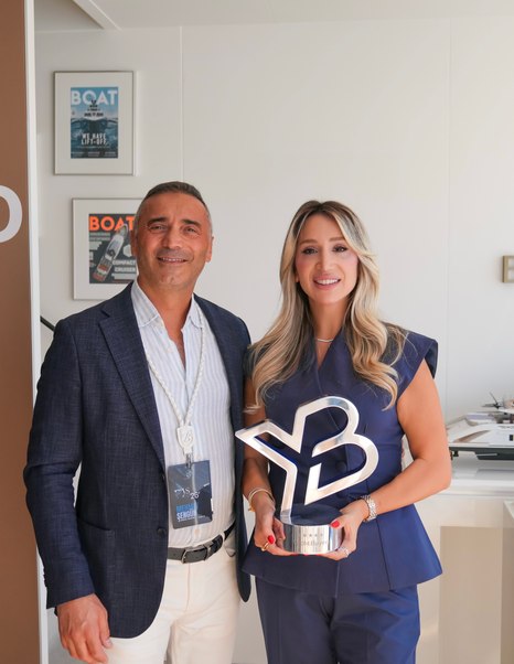 Marmara Region CEO Mehmet Şengün and Marketing Director Tuğba Şengün with YachtBuyer Hall of Fame Trophy