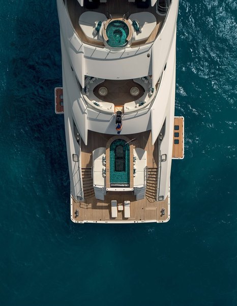 Aerial view of CRN Superyacht Amor à Vida stern with infinity pool