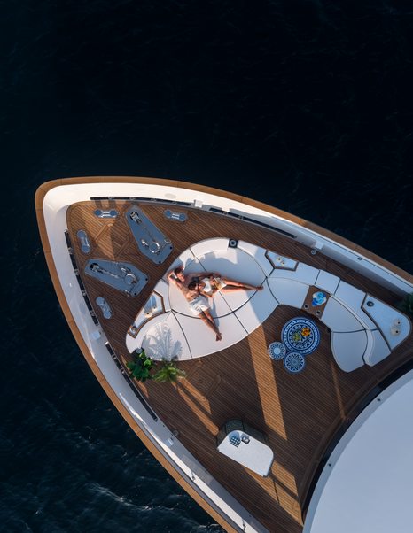 Sirena 118 foredeck owner’s terrace with wraparound seating and central sunpad