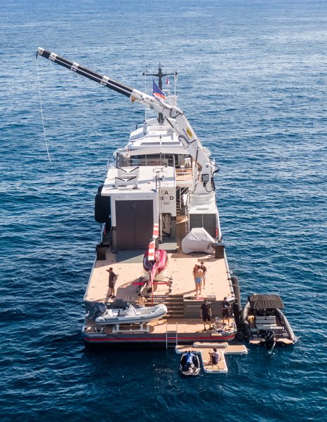 Damen Bad Company Support yacht at anchor stern view 