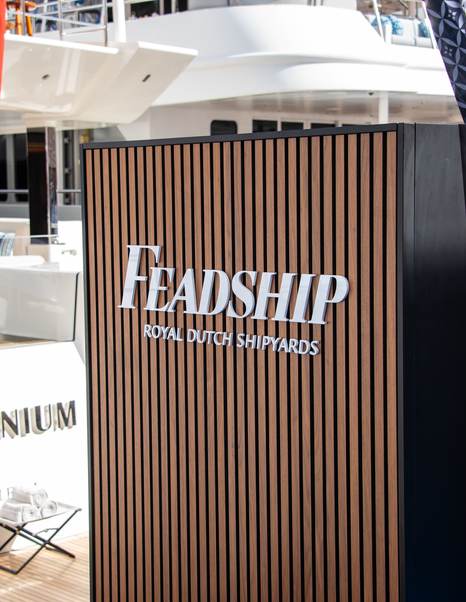 Feadship stand at the 2025 Monaco Yacht Show in front of superyacht Somnium