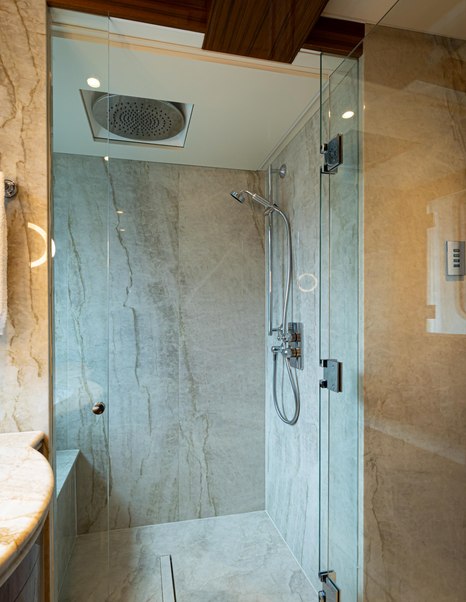 Aqua Lares superyacht ensuite with marble shower 