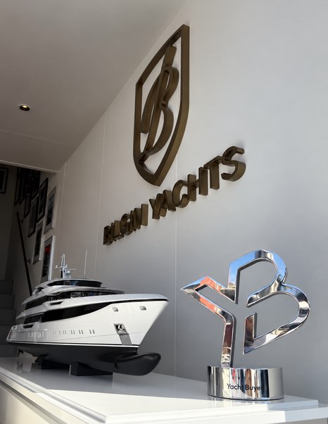 YachtBuyer Hall of Fame trophy next to Bilgin Superyacht Model at Monaco