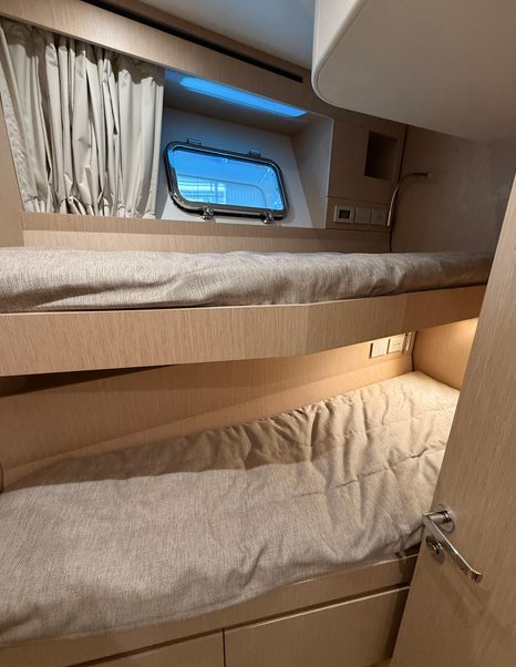 Bluegame-BGX83-Review-crew-cabin-bunk-beds-and-porthole