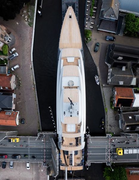 Aerial view of Feadship Superyacht Thalassa (Project 826) navigating dutch canals 