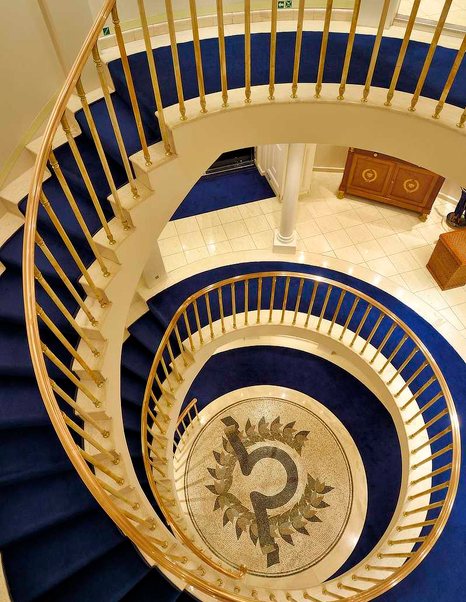 Superyacht Christina O interior spiral staircause 