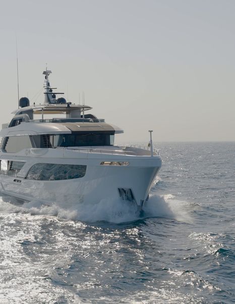 Gulf Craft Majesty 145 underway from the bow showing the raised pilothouse profile