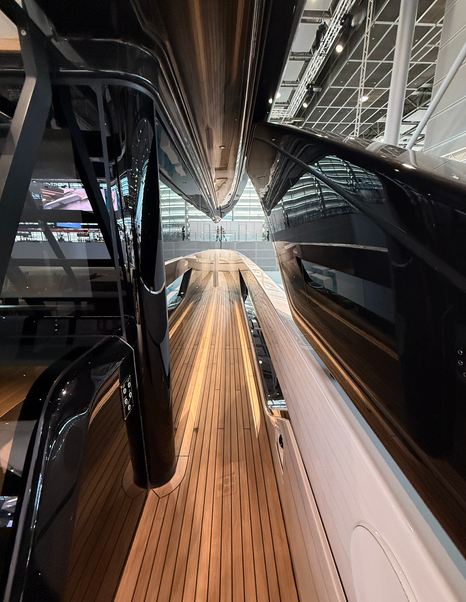 Bluegame-BGX83-Review-starboard-side-deck-glass-rail-and-teak-flooring