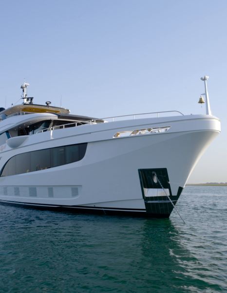 Bow view of the Gulf Craft Majesty 145 at anchor showing the slightly raked bow and foredeck