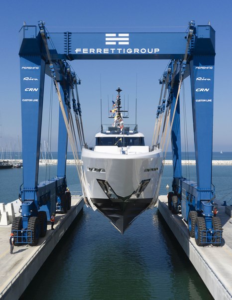 Bow shot of Custom Line Saetta 128 Superyacht being lowered into the water