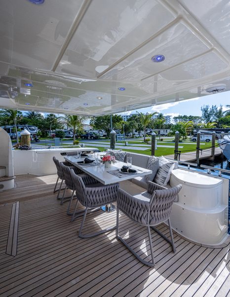 Ferretti motor yacht La Bella Vita aft deck dining area 
