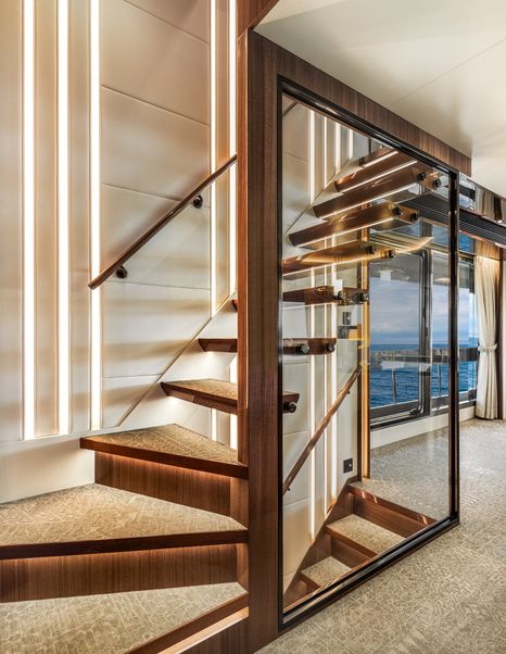 Horizon FD100 Skyline Superyacht interior staircase with integrated LED lighitng