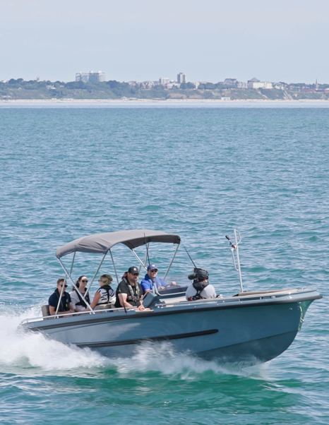 Evene Origin 71 carrying guests across Studland Bay