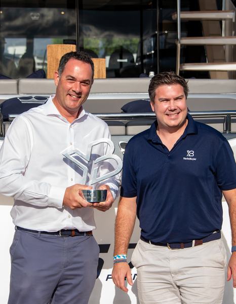 Jack Haines at the YB Hall of Fame trophy handover for the Princess S72 yacht at 2025 FLIBS