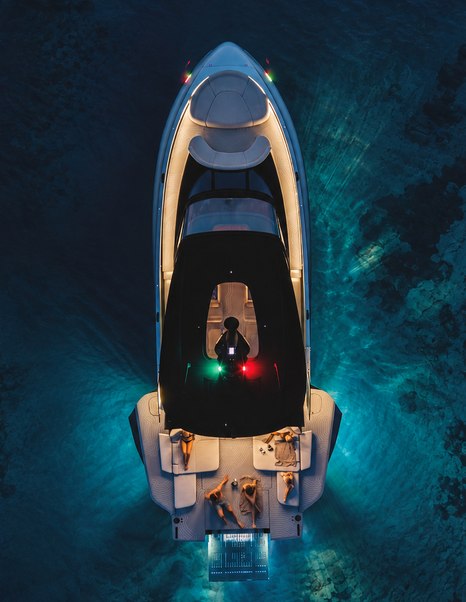 Aerial Rendering of ICONA 70 motor yacht at night water underwater lights