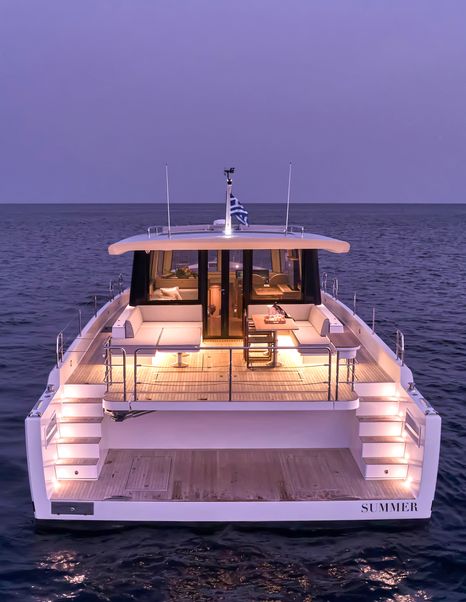 Omikron OT-60 motor yacht aft at anchor