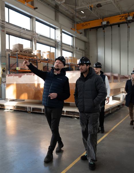 Tennis player Carlos Alcarez being shown around the Sunreef shipyard 