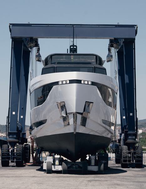 Second Arcadia A80 motor yacht suspended at launch on land 