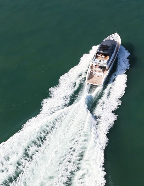 Sanlorenzo-SX76-Review-at-sea-drone-shot-running-wake