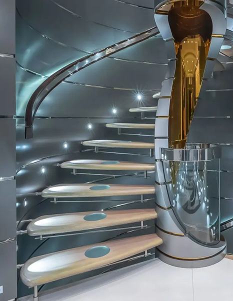 Abeking & Rasmussen Superyacht Scott Free metallic blue spiral staircase 