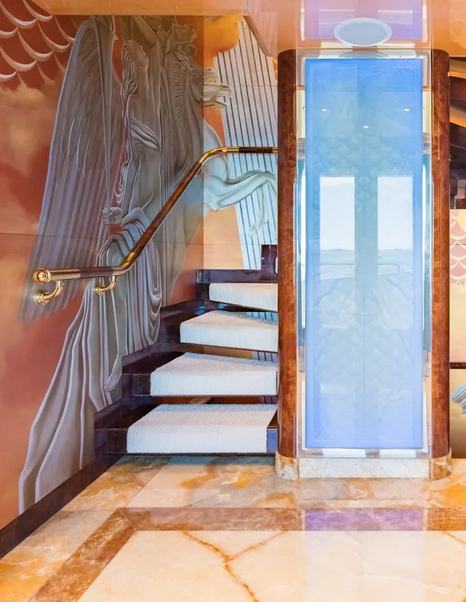 Superyacht Elis Et Mar interior staircase with marbled walls 