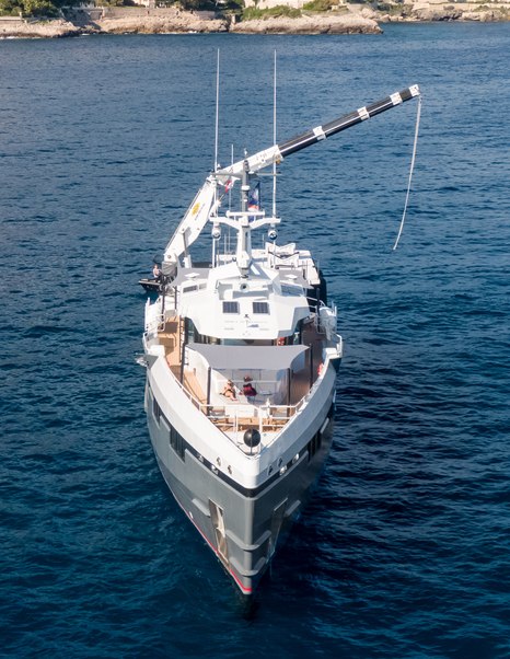 Damen Bad Company Support yacht at anchor foredeck view 