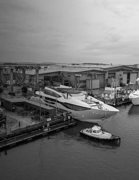 Sunseeker 134 Superyacht entering outfitting stage at Poole in black and white