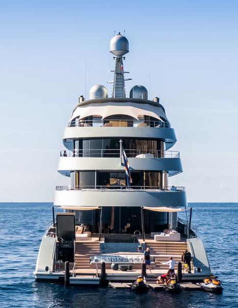 Superyacht Savannah aft decks at anchor with tenders deployed