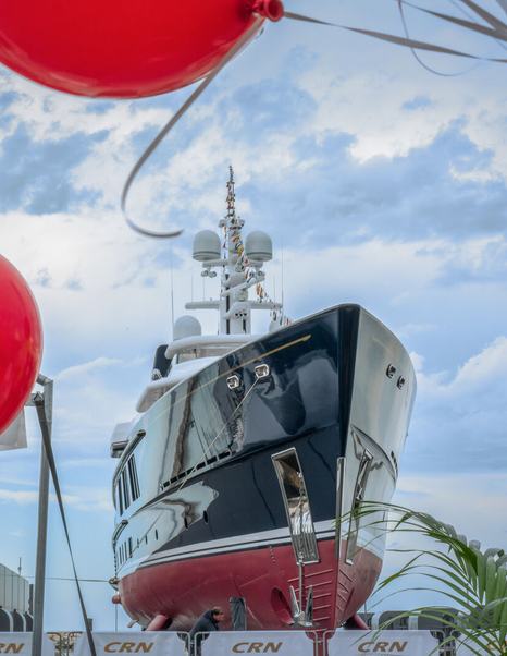Bow of superyacht Cerulean (Project Thunderball) with red balloons at launch