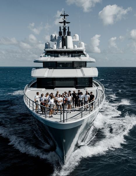 Workers on foredeck of Oceanco superyacht Leviathan 