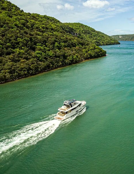 Beneteau Grand Trawler 63 cruising through sheltered coastal waters during a long-range passage