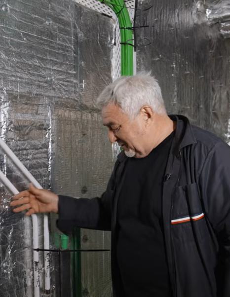 Alexei Mikhailov explaining pipe system in walkthrough 