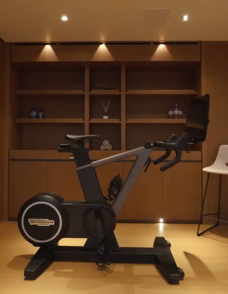 Superyacht Rilassata gym area with stationary electric bike 