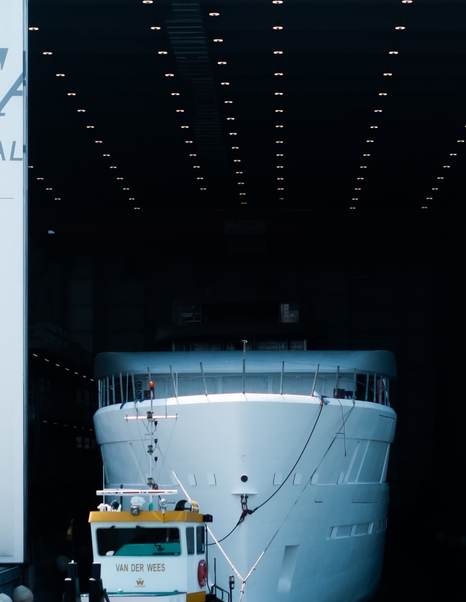 Bow shot of Superyacht Feadship 1015 leaving shipyard 