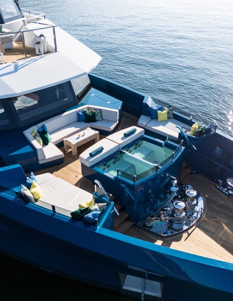 Aerial view of Expedition Yacht King Benji foredeck with split jacuzzi and U-shaped sunpads 