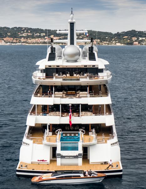Close up of Superyacht Amadea aft decks with tender and infinity pool
