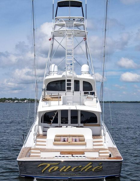 Stern shot of Viking 92EB Sportsfisher yacht Touche at anchor 