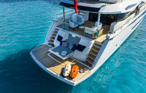 Aft view of Sunseeker 88 Yacht, with watersports equipment on the swim platform