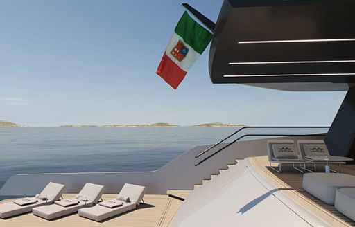 steps lead down to the oversized swim platform and aft deck area on board Maori 125 yacht