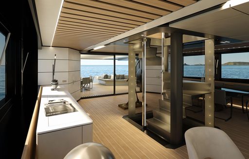 Spiral staircase and wet bar area on WHY200 yacht