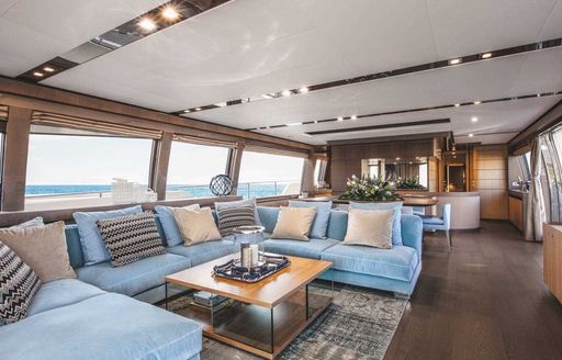  Modern interior fo yacht with lots of comfortable seating and table