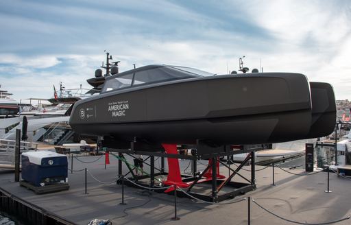 Tender boat on display at the Cannes Yachting Festival with American Magic on the side.