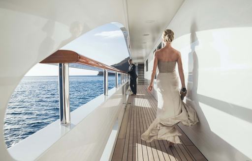 stewardess setting table for breakfast superyacht