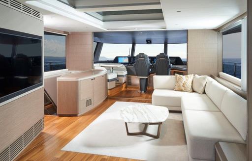 Skylounge on PRincess X95 with large sofa and flatscreen TV