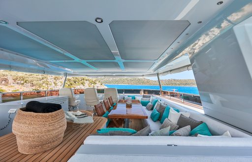 Covered seating area on deck of Bering B77 Explorer VERONIKA