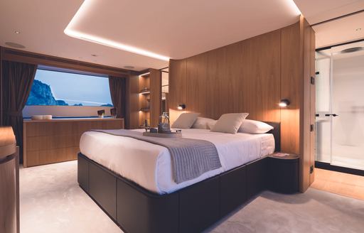 Master cabin onboard Oasis 34M, central berth with window to portside.